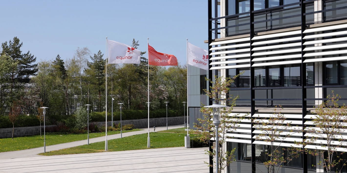 Equinor's headquarters at Forus - flags with company logo to the left