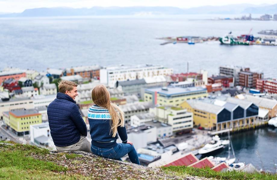 Employees overlooking a Norwegian town