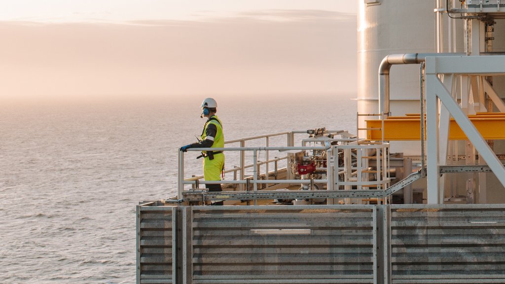 Employee looking out to the North Sea - at the Johan Sverdrup field